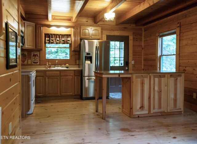 308 Black Mash Hollow Rd, Townsend, TN 37882 - kitchen featuring stainless steel fridge with ice dispenser, healthy amount of natural light, wood ceiling, beam ceiling, and a sink