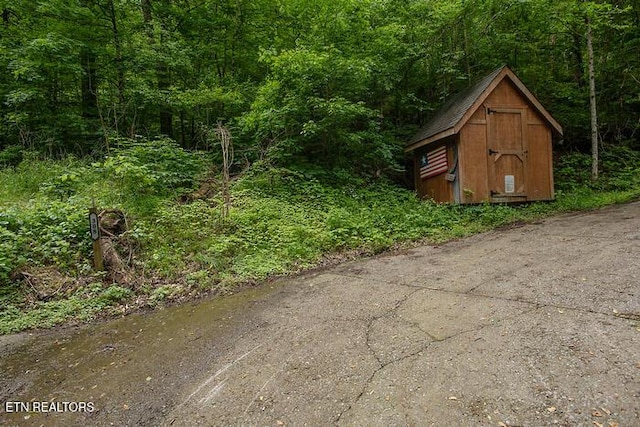 308 Black Mash Hollow Rd, Townsend, TN 37882 - view of shed featuring a view of trees