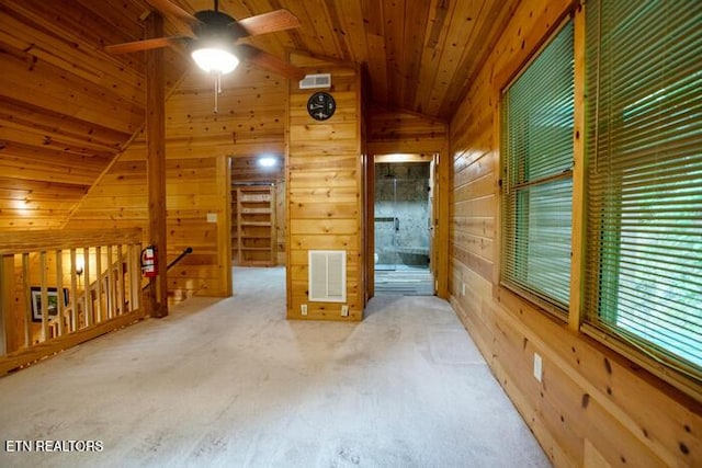308 Black Mash Hollow Rd, Townsend, TN 37882 - spare room with wood walls, lofted ceiling, ceiling fan, carpet floors, and wooden ceiling