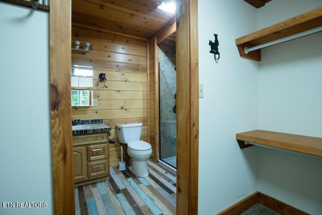 308 Black Mash Hollow Rd, Townsend, TN 37882 - bathroom with wooden ceiling, toilet, vanity, wood finished floors, and a shower stall