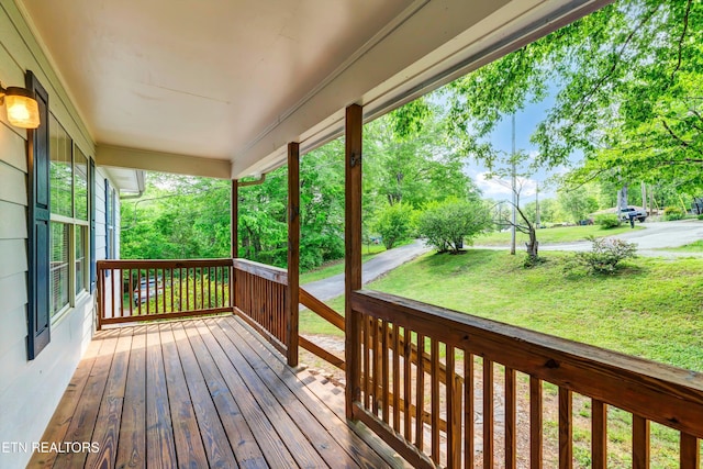 330 Ridgeview Dr, Oliver Springs, TN 37840 - wooden terrace featuring a yard and covered porch
