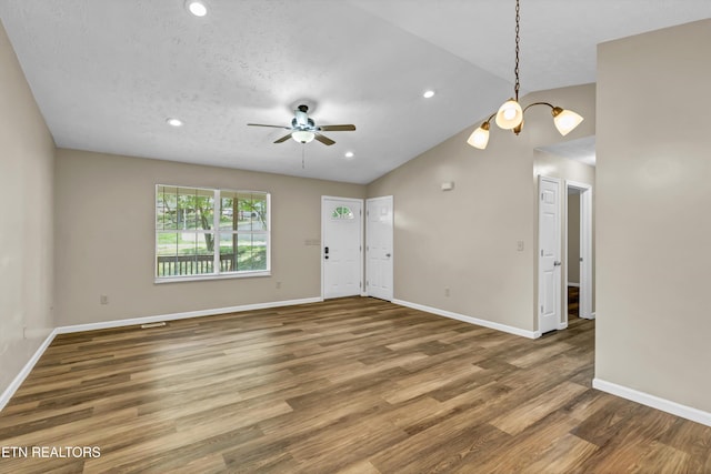 330 Ridgeview Dr, Oliver Springs, TN 37840 - unfurnished living room with ceiling fan, recessed lighting, baseboards, wood finished floors, and vaulted ceiling