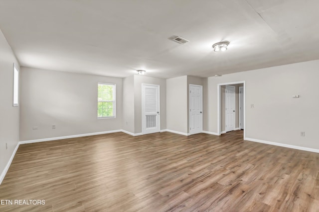 330 Ridgeview Dr, Oliver Springs, TN 37840 - empty room featuring baseboards, visible vents, and wood finished floors