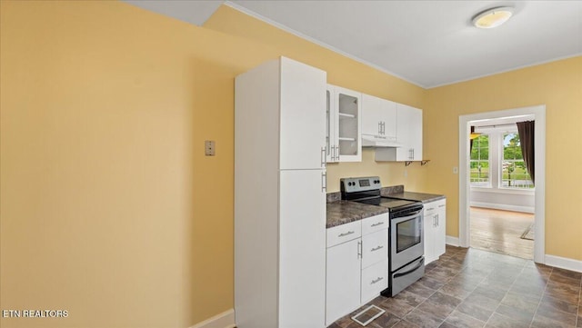 953 Maynard Ave, Knoxville, TN 37917 - kitchen with stainless steel electric range oven, under cabinet range hood, dark countertops, baseboards, and white cabinets