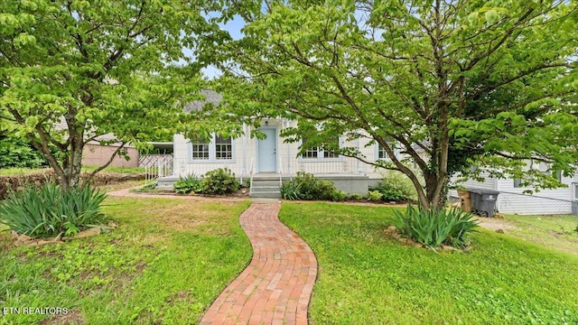 953 Maynard Ave, Knoxville, TN 37917 - obstructed view of property featuring a porch