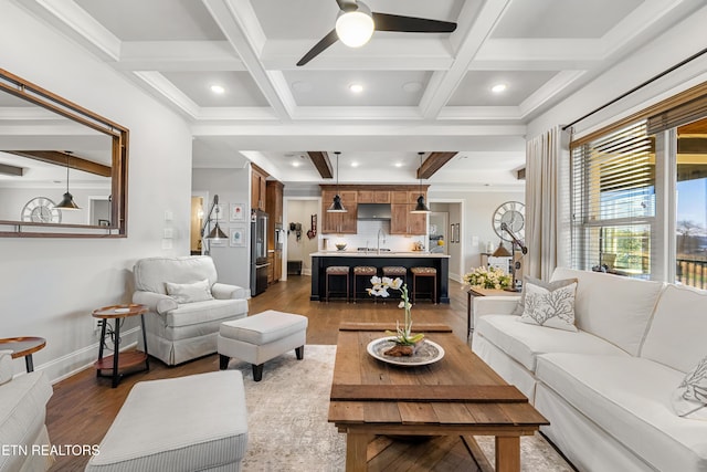 214 Watercrest Dr, Vonore, TN 37885 - living room with ceiling fan, beam ceiling, baseboards, wood finished floors, and coffered ceiling