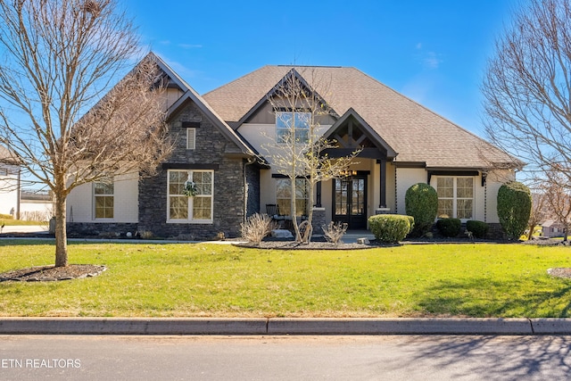 214 Watercrest Dr, Vonore, TN 37885 - craftsman-style house with french doors, a shingled roof, stone siding, and a front lawn