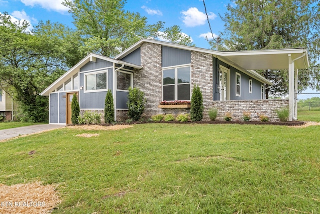 view of home's exterior with a lawn and brick siding