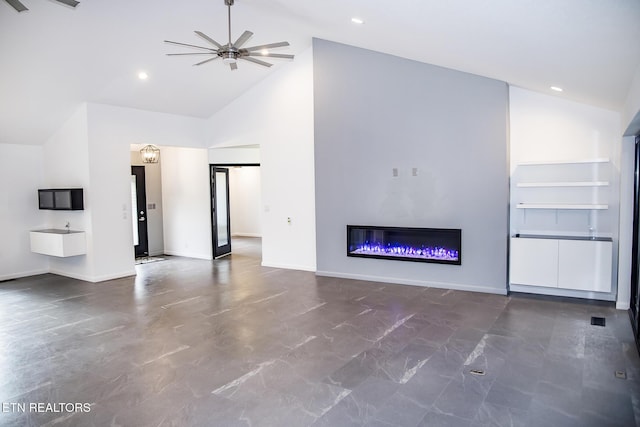 194 Forest View Dr, Crossville, TN 38558 - unfurnished living room with a glass covered fireplace, high vaulted ceiling, ceiling fan, and baseboards