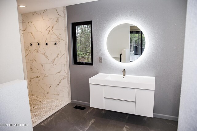 194 Forest View Dr, Crossville, TN 38558 - full bath with vanity, marble finish floor, a textured wall, baseboards, and walk in shower