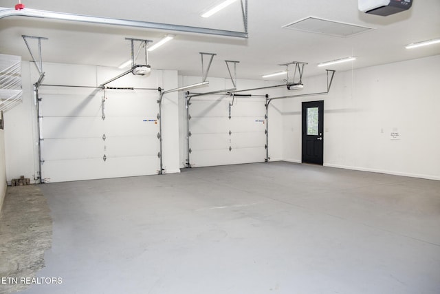 194 Forest View Dr, Crossville, TN 38558 - garage featuring a garage door opener