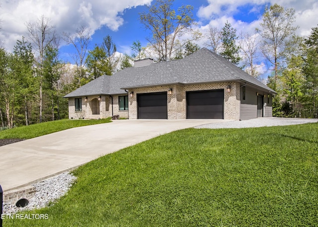 194 Forest View Dr, Crossville, TN 38558 - single story home with a chimney, brick siding, a front lawn, concrete driveway, and an attached garage