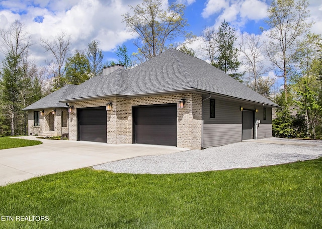 194 Forest View Dr, Crossville, TN 38558 - view of side of home featuring roof with shingles, brick siding, a garage, concrete driveway, and a lawn