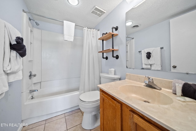 bathroom with toilet, shower / bath combo with shower curtain, a textured ceiling, vanity, and tile patterned flooring