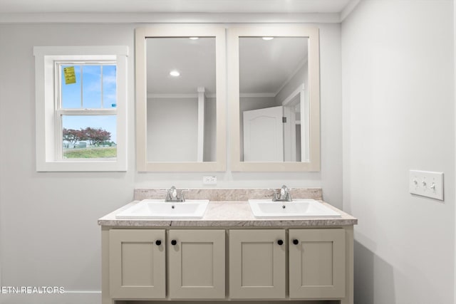 bathroom featuring double vanity and a sink