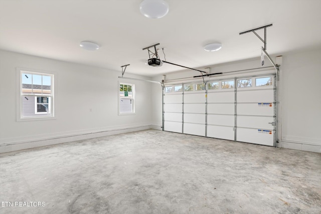 garage featuring a garage door opener