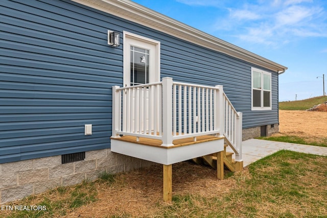 view of property exterior featuring a deck