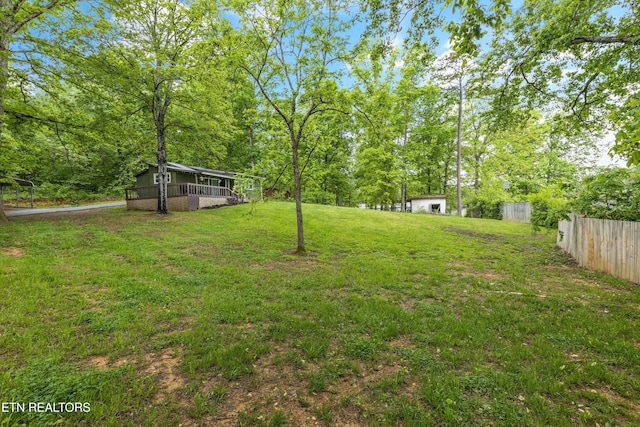 view of yard with fence
