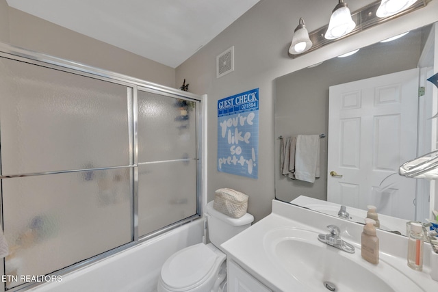 full bathroom with vanity, enclosed tub / shower combo, toilet, and visible vents