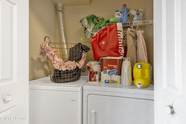 laundry room with laundry area and washer and clothes dryer