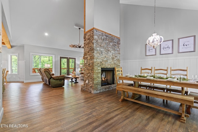 3487 Summit Trails Dr, Sevierville, TN 37862 - dining space with a healthy amount of sunlight, high vaulted ceiling, and wood finished floors