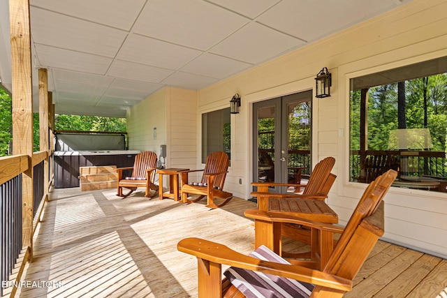 3487 Summit Trails Dr, Sevierville, TN 37862 - wooden terrace with a hot tub and french doors