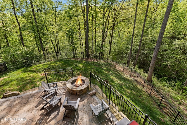 3487 Summit Trails Dr, Sevierville, TN 37862 - view of patio / terrace featuring a fenced backyard and an outdoor fire pit