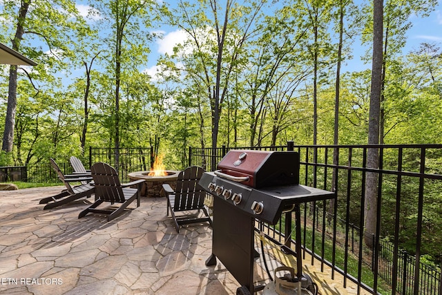 3487 Summit Trails Dr, Sevierville, TN 37862 - view of patio / terrace with a grill and a fire pit