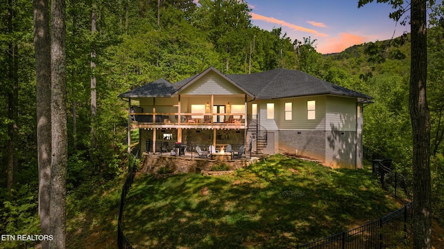 3487 Summit Trails Dr, Sevierville, TN 37862 - back of house with a wooden deck, a yard, a patio area, and stairway