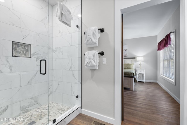 3487 Summit Trails Dr, Sevierville, TN 37862 - bathroom featuring baseboards, ensuite bathroom, a stall shower, and wood finished floors