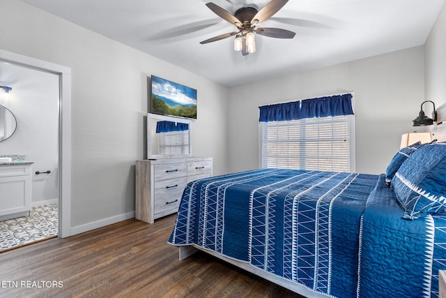 3487 Summit Trails Dr, Sevierville, TN 37862 - bedroom with baseboards, ensuite bathroom, a ceiling fan, and wood finished floors