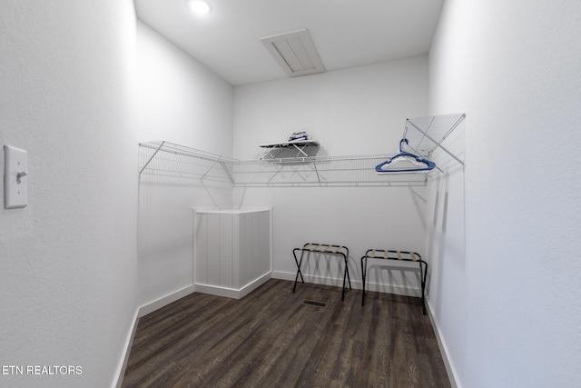 3487 Summit Trails Dr, Sevierville, TN 37862 - walk in closet featuring attic access, wood finished floors, and visible vents