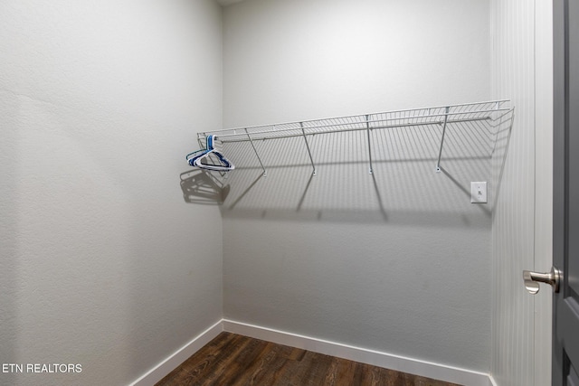 3487 Summit Trails Dr, Sevierville, TN 37862 - walk in closet featuring dark wood-style flooring