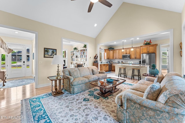 112 Naduli Trl, Vonore, TN 37885 - living area featuring a ceiling fan, high vaulted ceiling, plenty of natural light, and light wood-type flooring