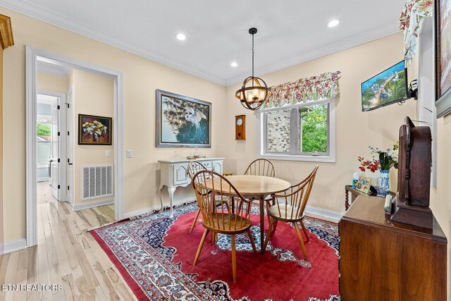 112 Naduli Trl, Vonore, TN 37885 - dining space with crown molding, baseboards, and visible vents