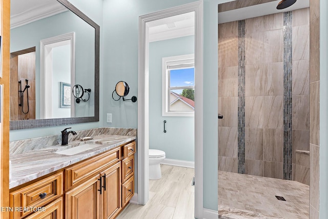 112 Naduli Trl, Vonore, TN 37885 - full bath featuring crown molding, a tile shower, vanity, baseboards, and toilet