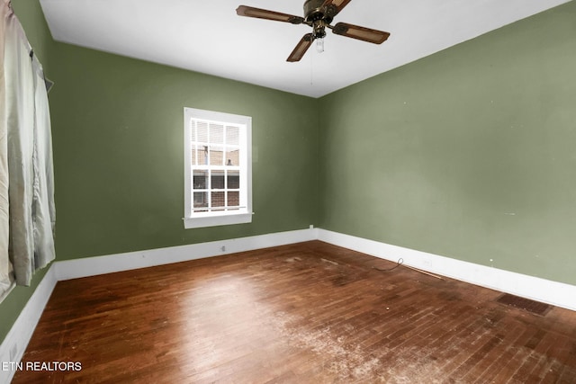 550 Margrave, Harriman, TN 37748 - spare room featuring a ceiling fan, wood finished floors, and baseboards