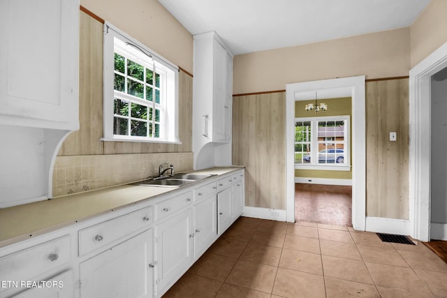 550 Margrave, Harriman, TN 37748 - kitchen with a sink, an inviting chandelier, a wealth of natural light, and white cabinetry