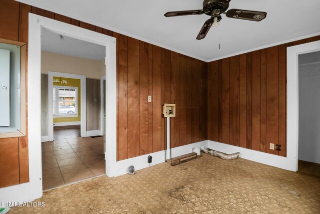 550 Margrave, Harriman, TN 37748 - spare room featuring wooden walls and ceiling fan