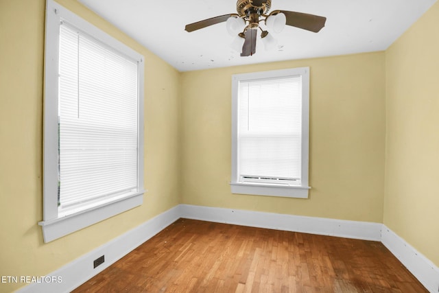 550 Margrave, Harriman, TN 37748 - unfurnished room featuring baseboards, ceiling fan, and wood finished floors