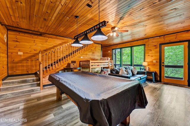 recreation room featuring wood finished floors, pool table, ceiling fan, wooden walls, and wood ceiling