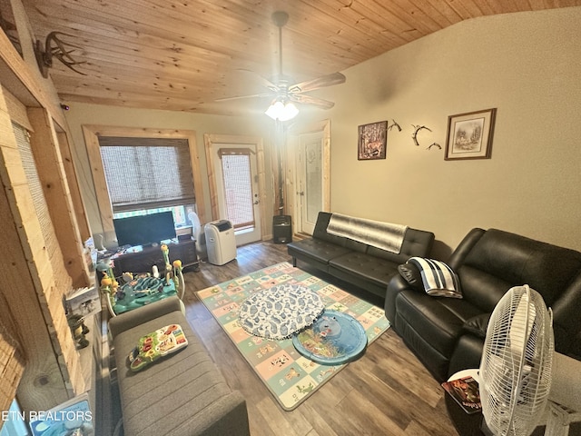 living area featuring wood finished floors, wood ceiling, a ceiling fan, and lofted ceiling