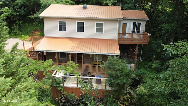 4017 Hatcher Hollow Rd, Walland, TN 37886 - rear view of house with metal roof and stairs