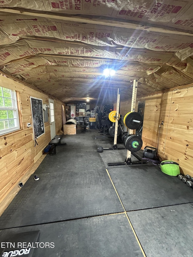 workout room with wooden walls