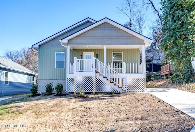 1624 Folsom Ave, Knoxville, TN 37917 - bungalow with a porch, board and batten siding, and stairs