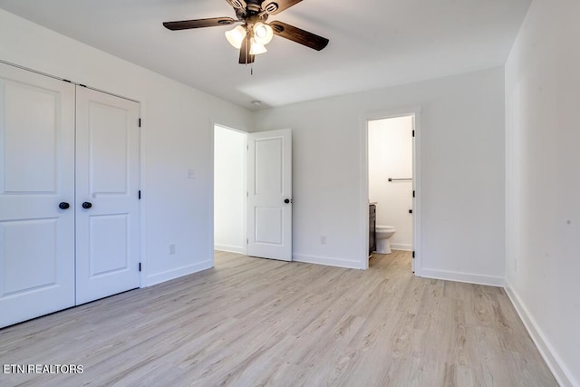1624 Folsom Ave, Knoxville, TN 37917 - unfurnished bedroom featuring light wood-style flooring, a ceiling fan, baseboards, ensuite bathroom, and a closet
