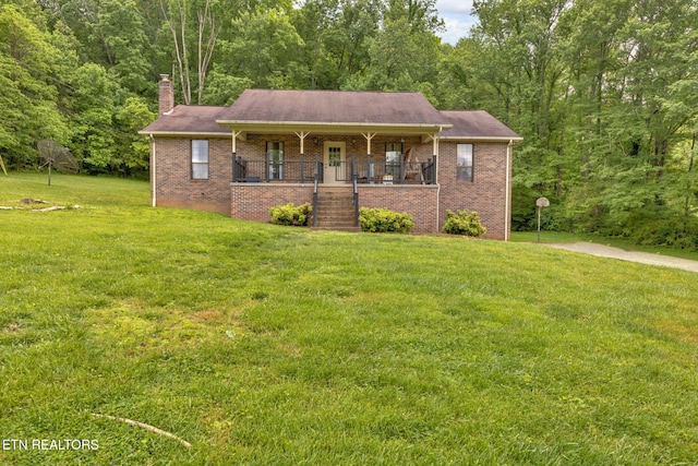 243 Bunch Ln, Clinton, TN 37716 - single story home with covered porch, a front lawn, stairway, and a chimney