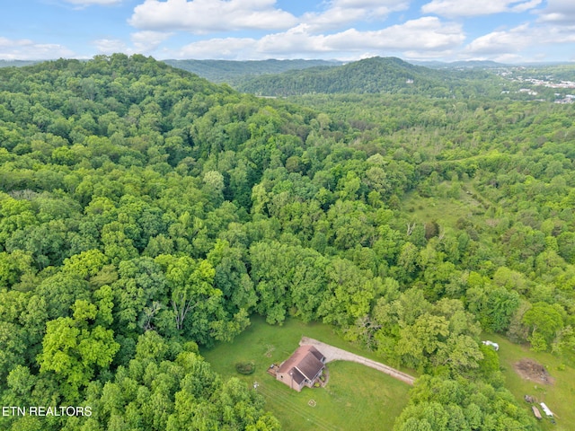 243 Bunch Ln, Clinton, TN 37716 - aerial view of a heavily wooded area and a mountain backdrop