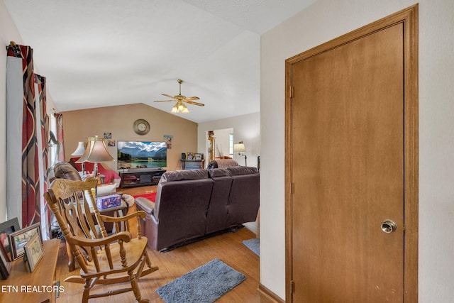 243 Bunch Ln, Clinton, TN 37716 - living area with ceiling fan, light wood-style flooring, and vaulted ceiling