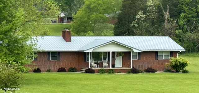 209 Dunn Cir, Speedwell, TN 37870 - ranch-style home with covered porch, brick siding, and a front yard